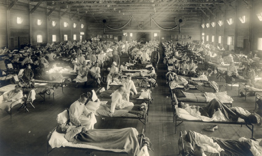 Crowded emergency hospital full of patients and nurses circa 1918