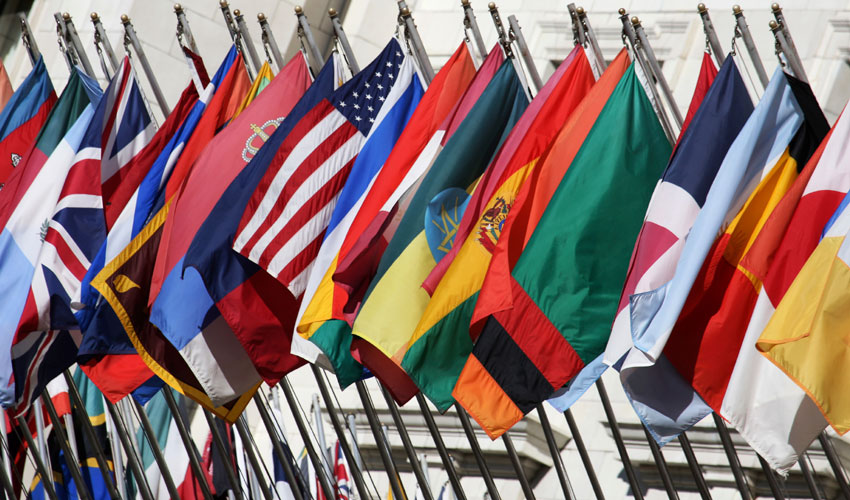 A photo featuring various world flags.