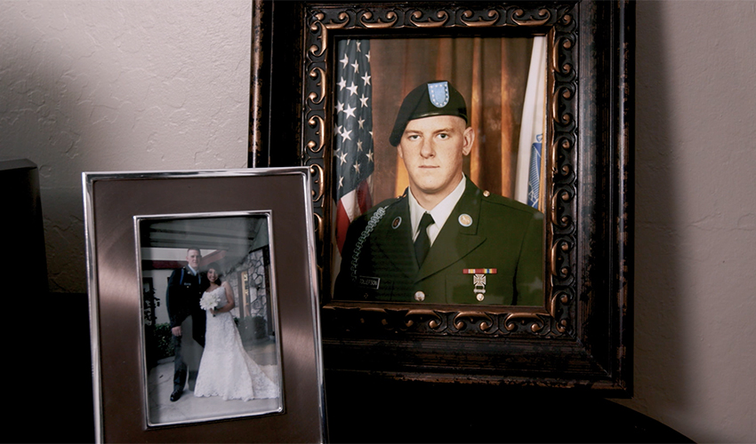 Photo of framed photos of Army Private Benjamin Tollefson