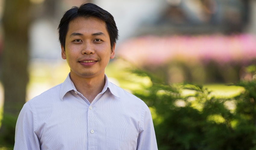 Assistant Professor of Civil Engineering Zhaoshuo Jiang stands outdoors