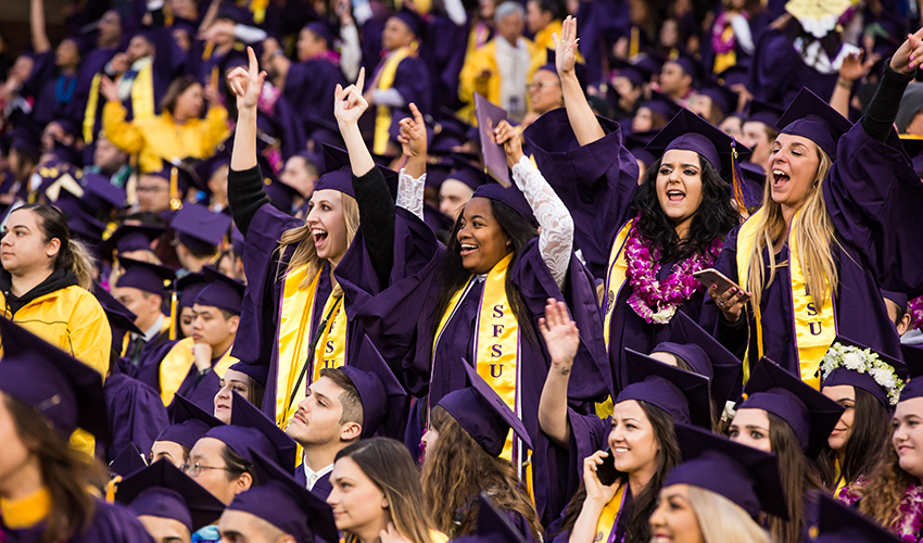 Crowd of SF State graduates cheers during Commencement