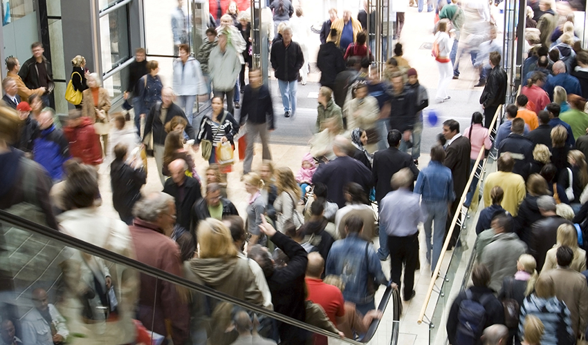 A photo of a crowded shopping mall.