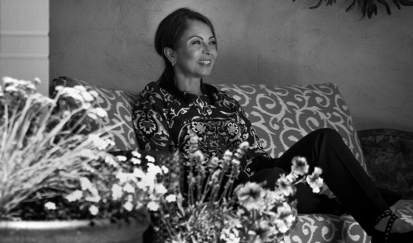A black and white photo of Neda Nobari.
