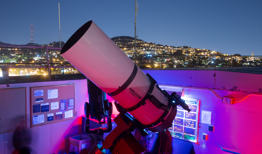 A telescope on the roof of an academic building