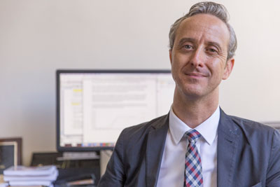 Jason McDaniel, SF State assistant professor of political science in his office on campus.