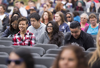 Students and family listen to a speaker at SF State's Welcome Days