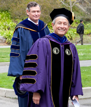 A photo of SF State President Leslie E. Wong walking in the investiture process, followed by CSU Chancellor Timothy P. White
