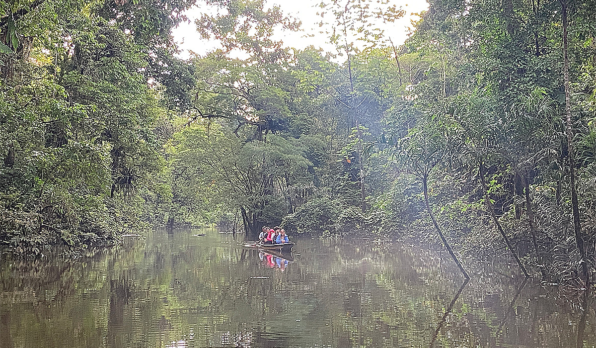 People on a canoe on the Tiputini River