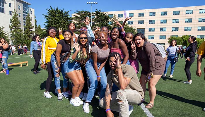  Group of students smiling at GatorFest