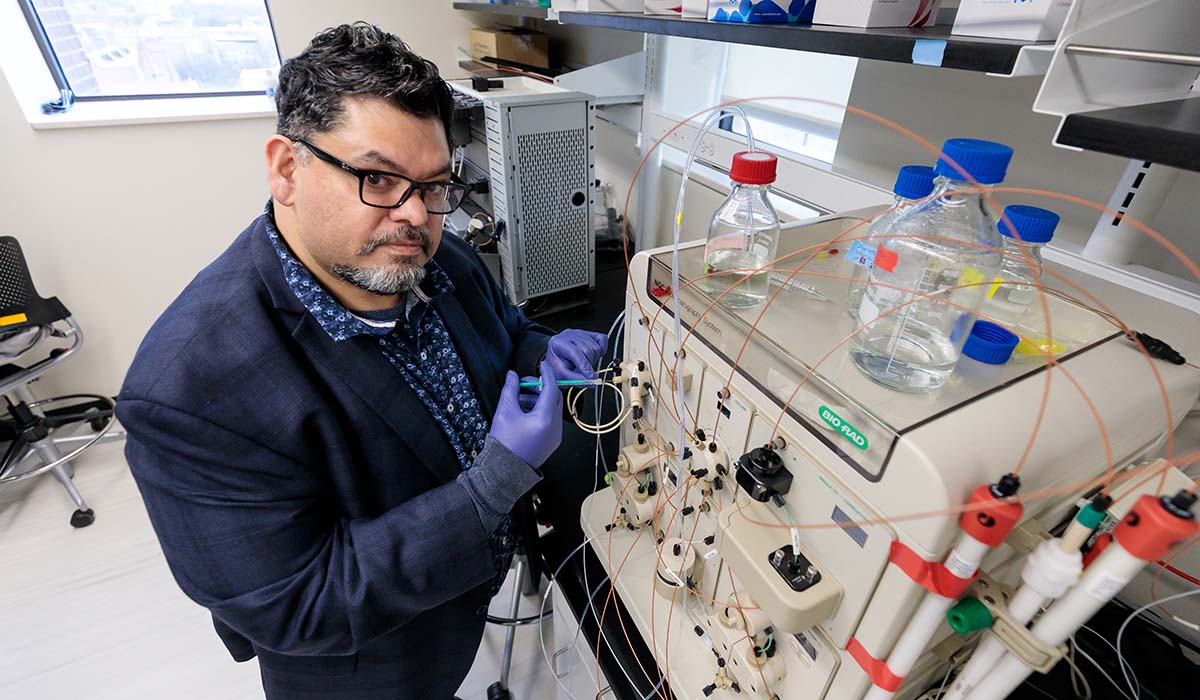 Juan Mendoza working in his lab