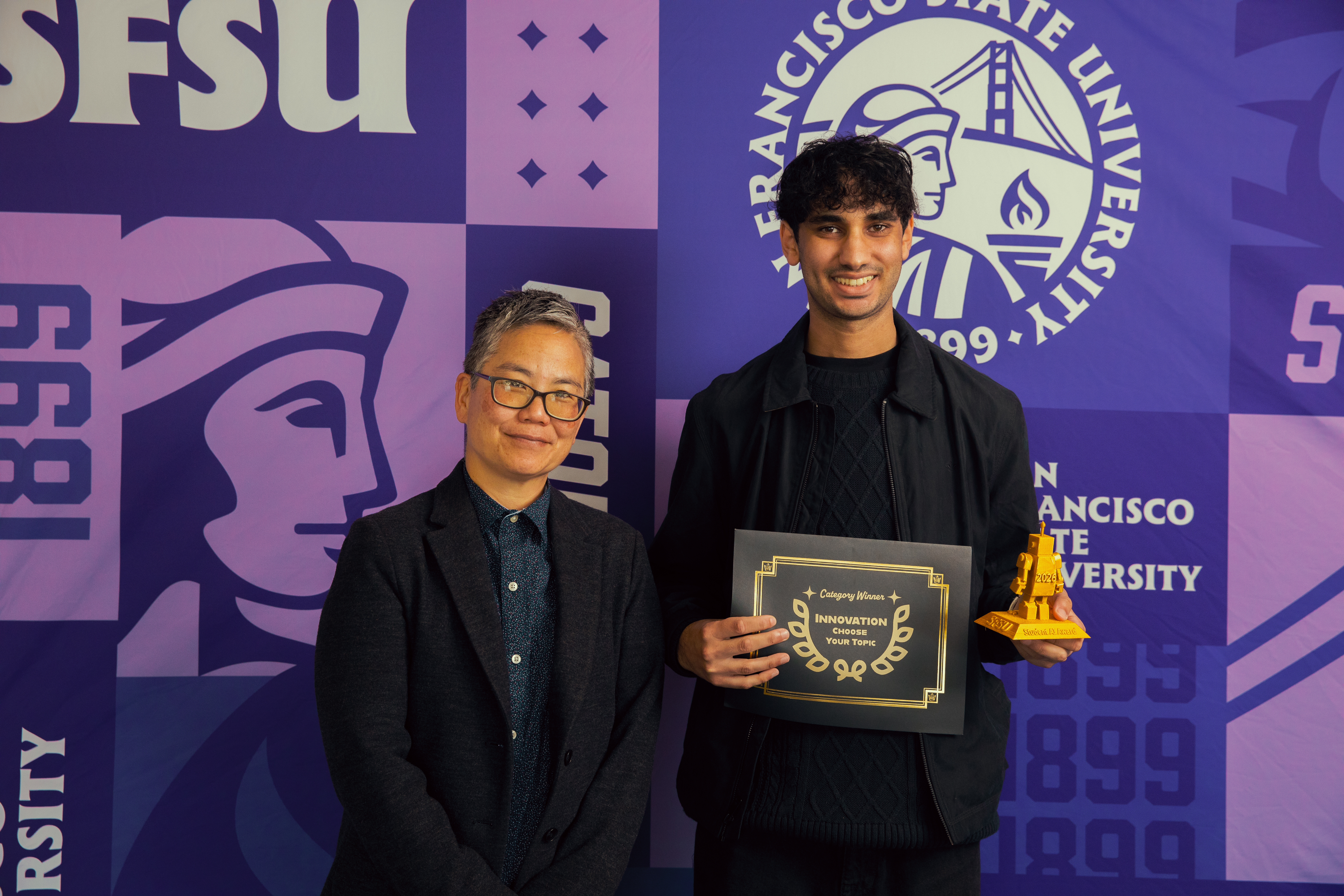 Kareem Amin pictured with Provost Amy Sueyoshi 