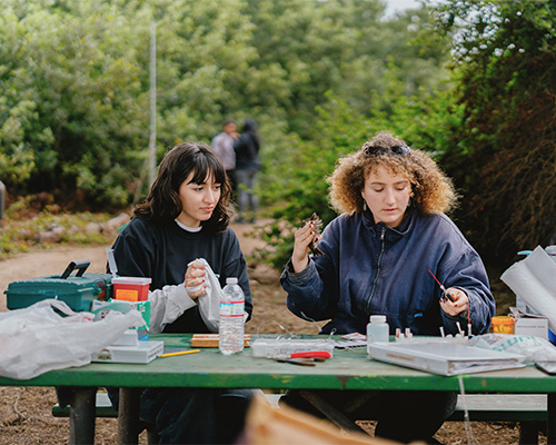 Lilly teaching another student how to collect and prep samples