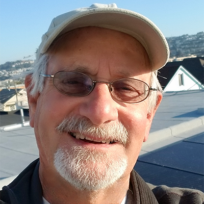 Bruce Neuberger selfie taken on the roof of his home in San Francisco on a sunny day