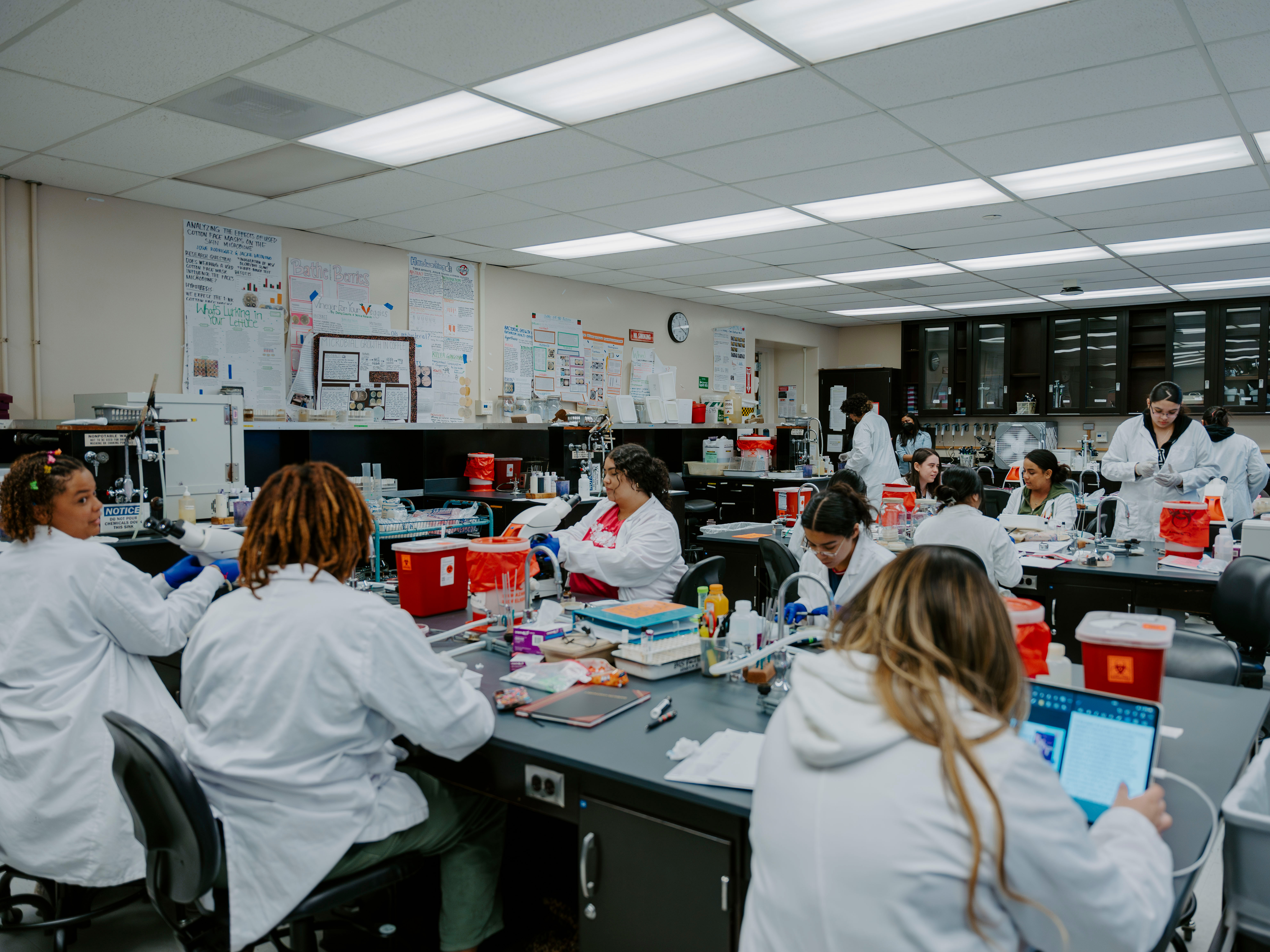 Many students working in a lab classroom