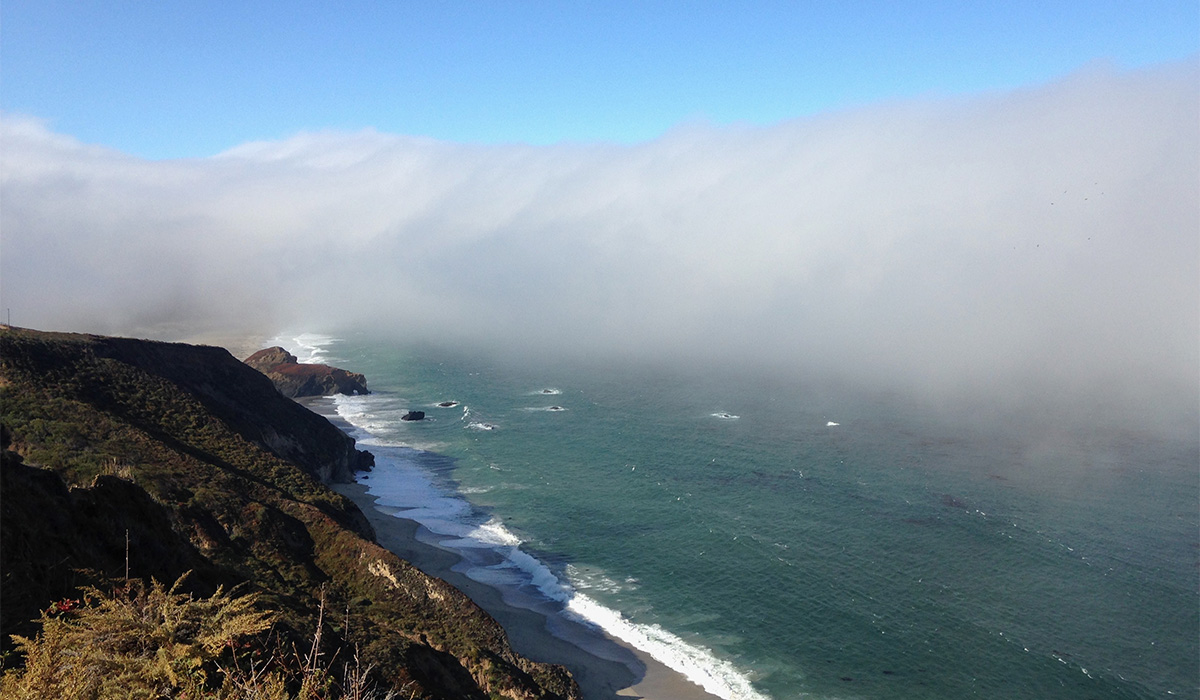 coastline with fog in the distance