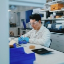 Elmer building electrodes at the lab bench