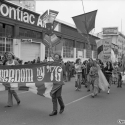 Marchers holding a banner with the text Gay Freedom by ’76 at O’Farrell and Polk streets in San Francisco during the Gay Freedom Day Parade on June 30, 1974
