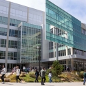 Students walking in front of library