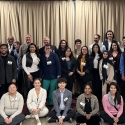 A group photo of people attending the PLFP anniversary celebration