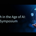 A graphic for the Research in the Age of AI Faculty Symposium featuring a hand opening up to a circle of images surrounded by a graduation cap image