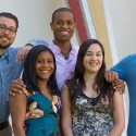 Five students smiling at camera