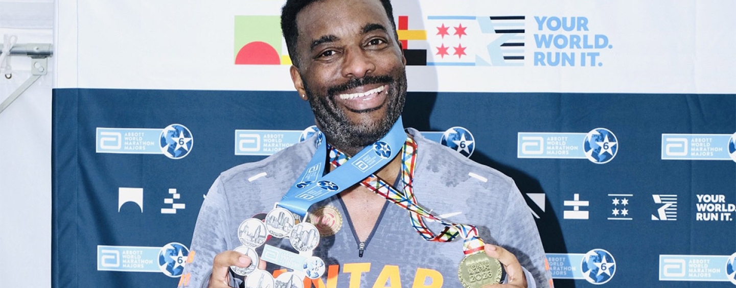 Antar Johnson poses with the six star medal and the Tokyo marathon medal 