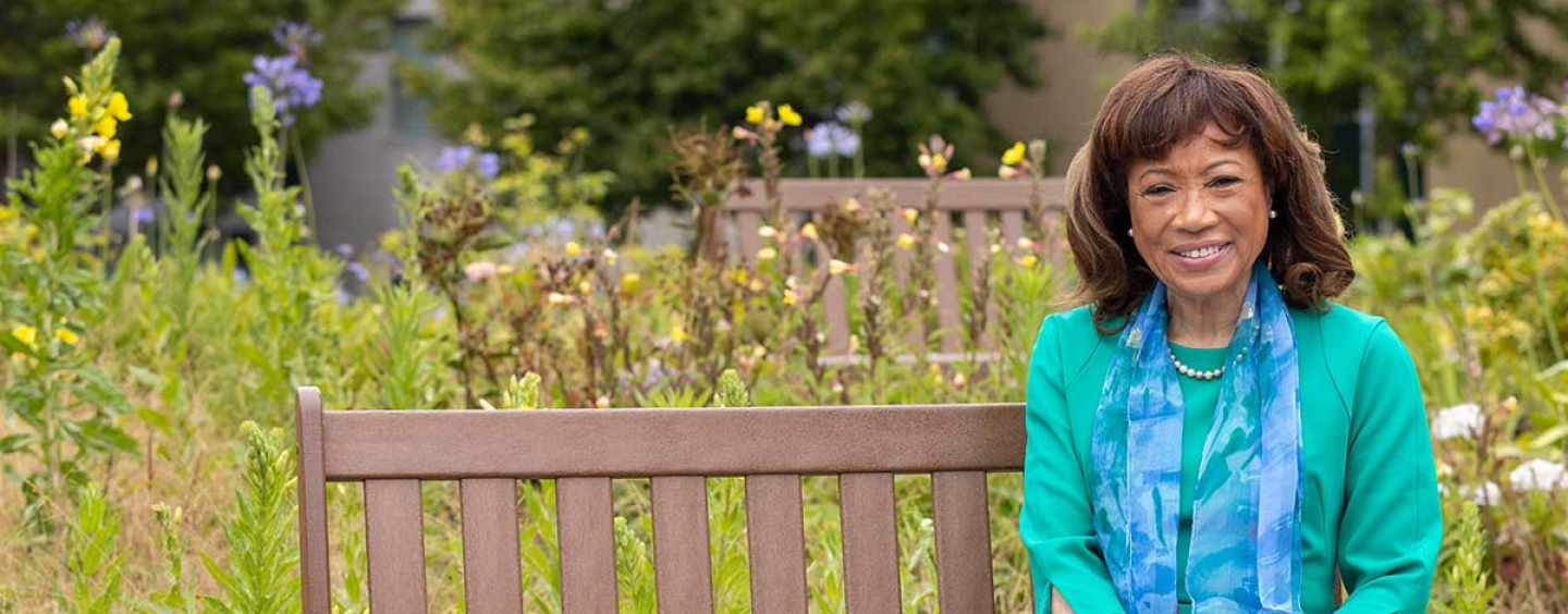 Diane Harris sitting on a bench