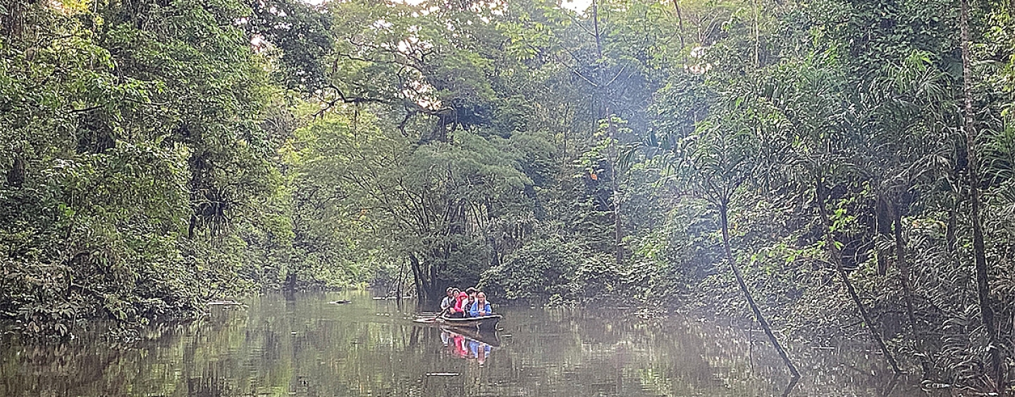 People on a canoe on the Tiputini River