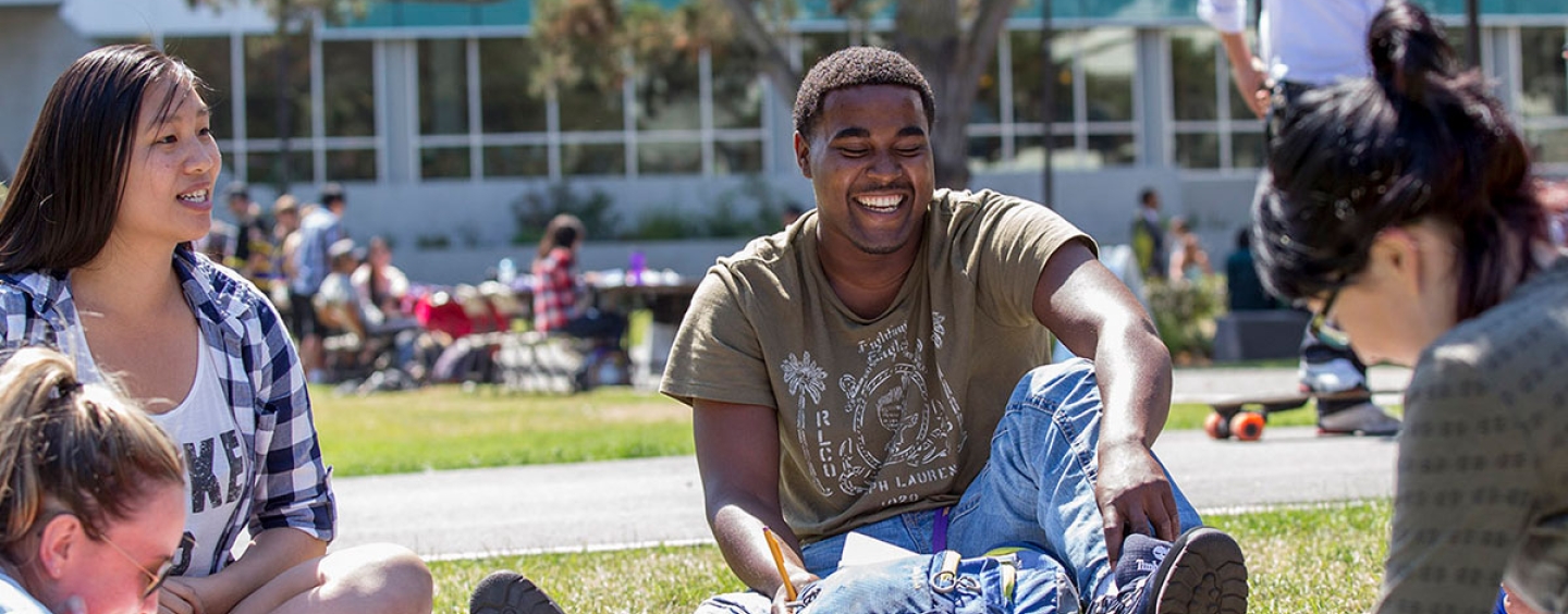 Students talk and laugh on the Quad