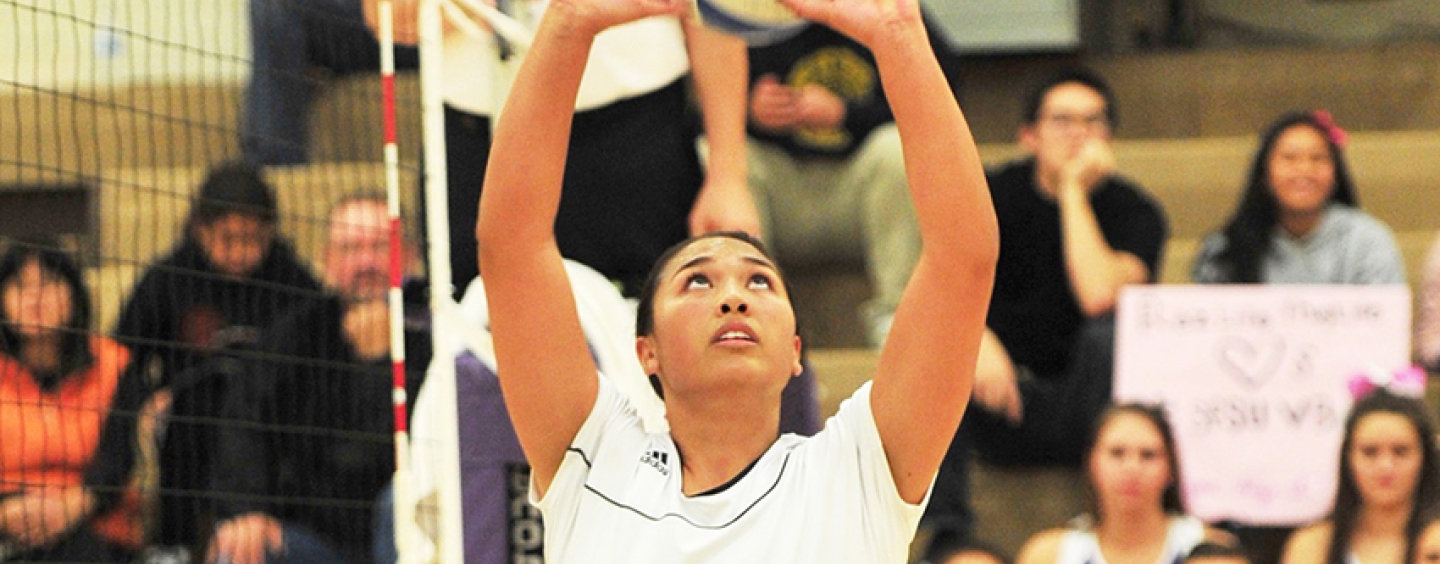 Iris Tolenada handles a volleyball during an SF State match