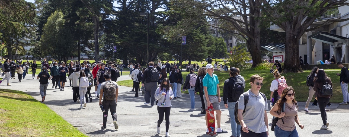 Students walk past the Quad on campus