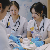 Nursing students in pediatric simulation lab