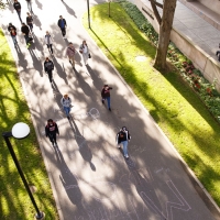 Students walk onto campus